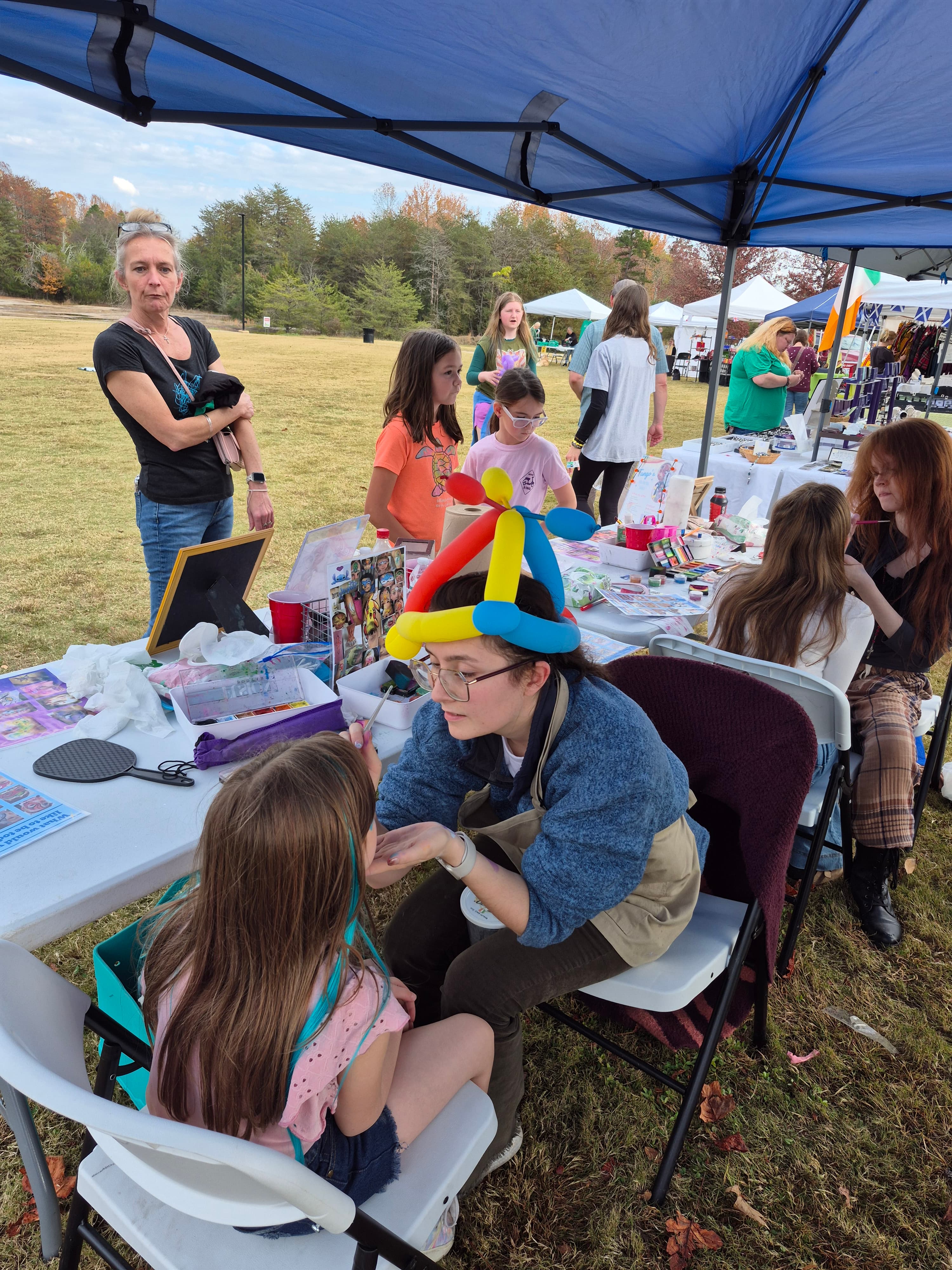Kids face painting at party